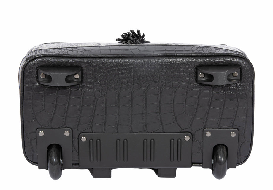 Bottom view of a white and black python snakeskin print bag, featuring two front feet for stability and two smooth, all-terrain wheels. Designed to relieve shoulder and back strain, this bag is perfect for effortless mobility during work or travel.
