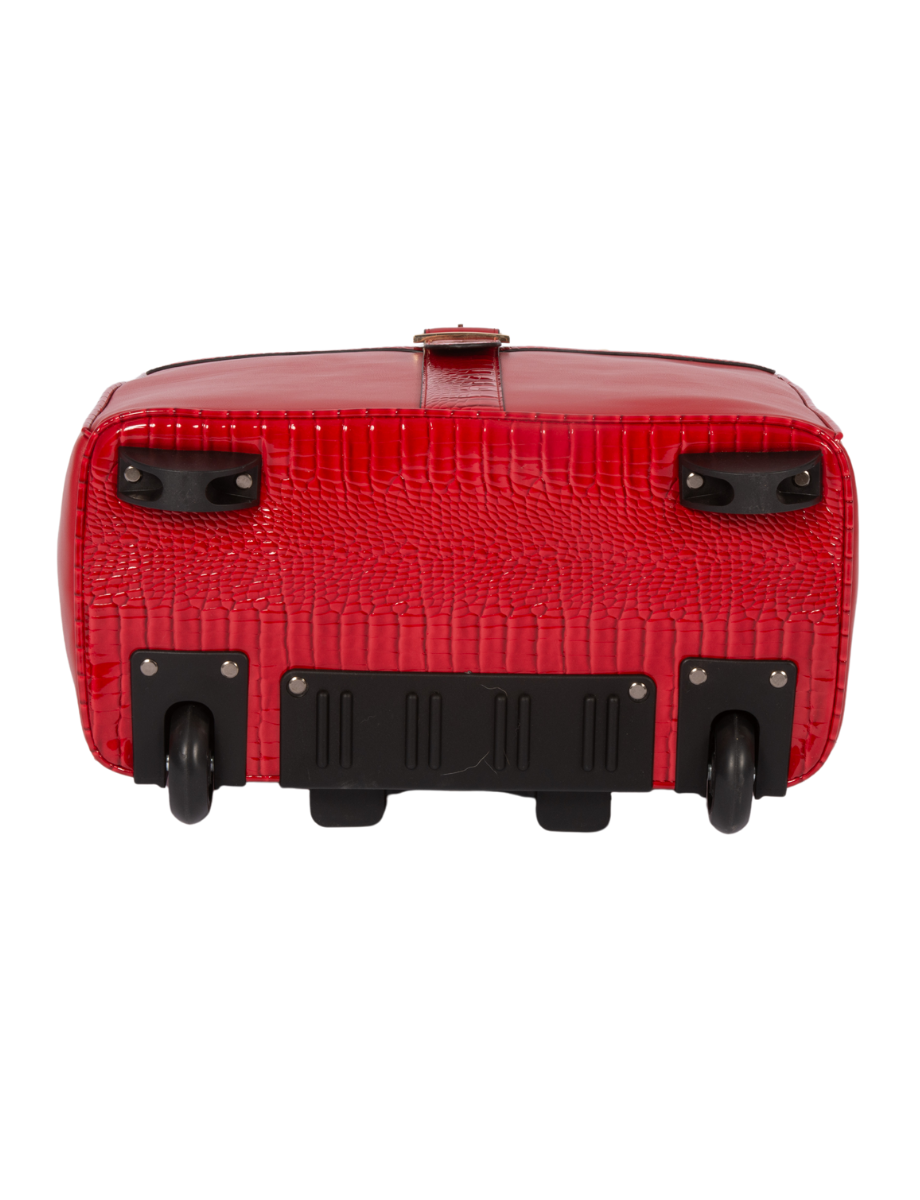 Bottom of the red laptop bag displaying its two sturdy rolling wheels and reinforced base. Two front feet keep the bag off the ground and prevent the bag from tipping over when letting go of the handle. This professional travel bag for women is designed to roll easily through airports and office buildings. Ideal for nurses, teachers, and corporate professionals who want a reliable rolling work bag that helps prevent shoulder and back pain while carrying laptops, files, and essentials on the go.