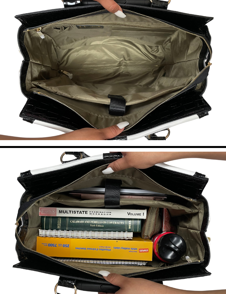 Interior of the white and black wheeled work tote purse shown empty, revealing padded laptop compartment, pen slots, and multiple organizer pockets including a large pocket with zipper. Perfect for women looking for a rolling bag for business, nursing school, or travel. This wheeled laptop tote fits 15.6" laptops and is ideal for organizing work supplies. Use as a flight-ready women’s rolling bag or travel weekender or thoughtful gift idea for teachers or business travelers with a lot to carry.