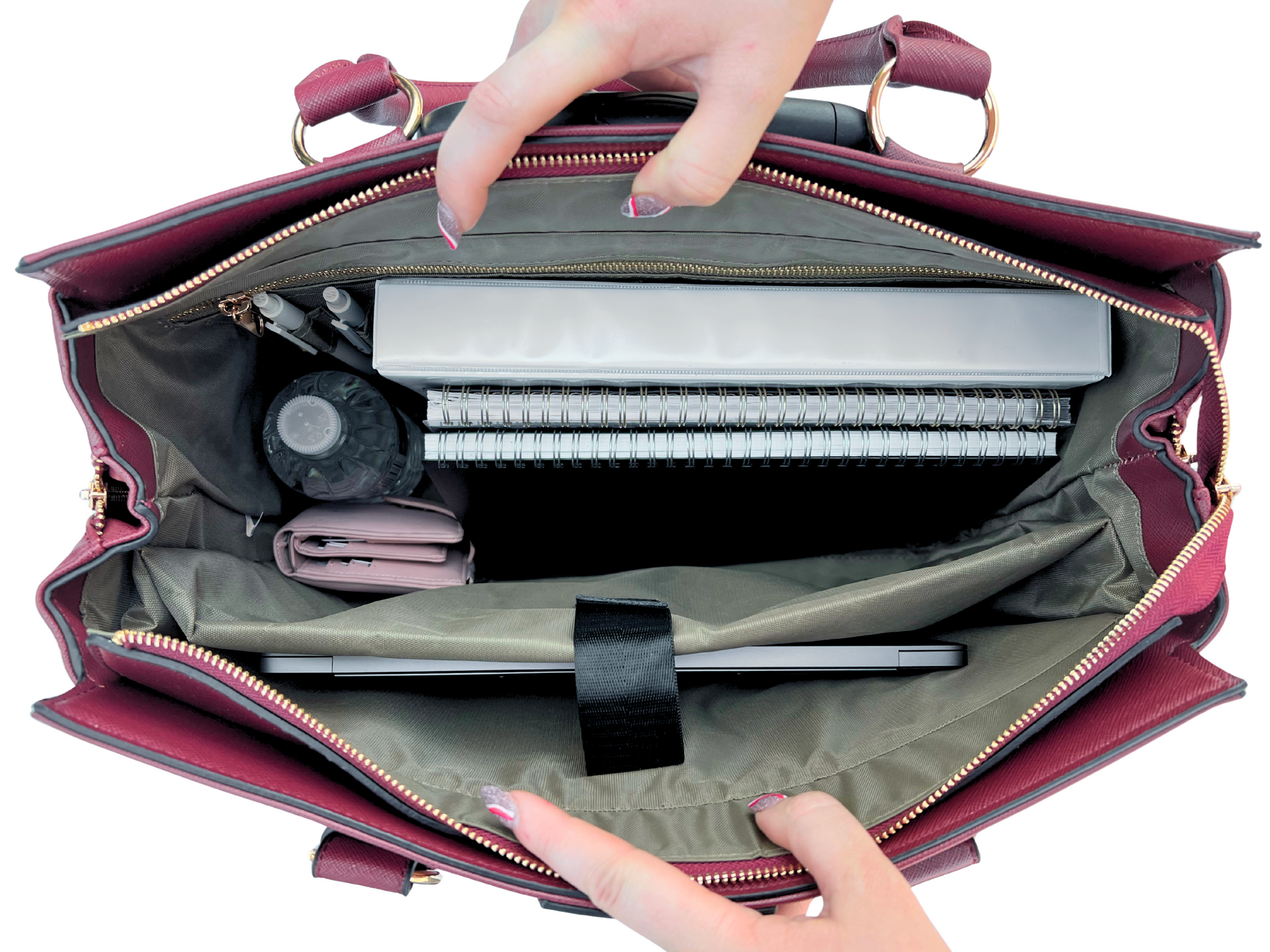Interior of the Executive Burgundy rolling bag revealing a padded laptop sleeve, pen slots, pockets, and main compartment. Perfect to organize and store all your work, travel, or school essentials including a laptop, textbooks, notebooks, planners, journals, chargers, ipads, and other supplies. The tote is perfect for teachers, businesswomen, and more. Ideal for those seeking a laptop shoulder bag or work tote that keeps items secure and organized for travel, business meetings, or the classroom.