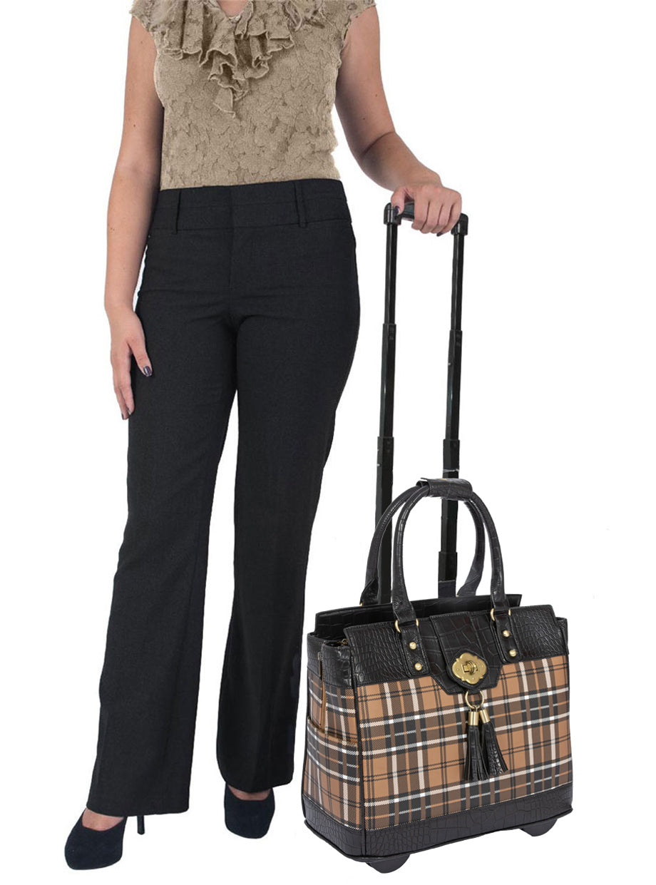 Stylish plaid rolling laptop bag with telescoping handle and wheels. Feminine, professional work tote with padded laptop sleeve, multiple interior pockets, and detachable shoulder strap. Versatile carry-on or overnight bag for business travel.