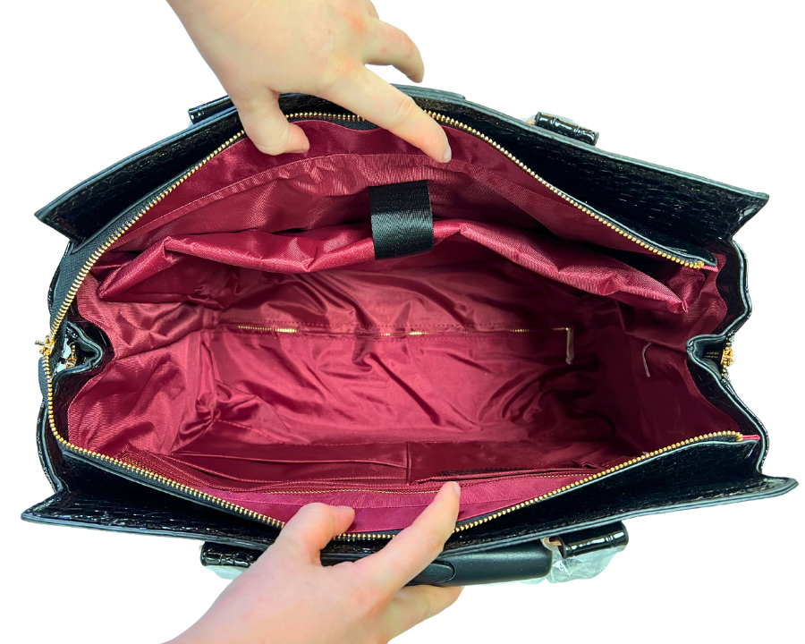 Spacious interior of this stylish computer bag for laptops for women, designed to hold a laptop, files, notebooks, and essentials for teachers, nurses, and professionals. Perfect for keeping organized on the go with ample room for daily needs.