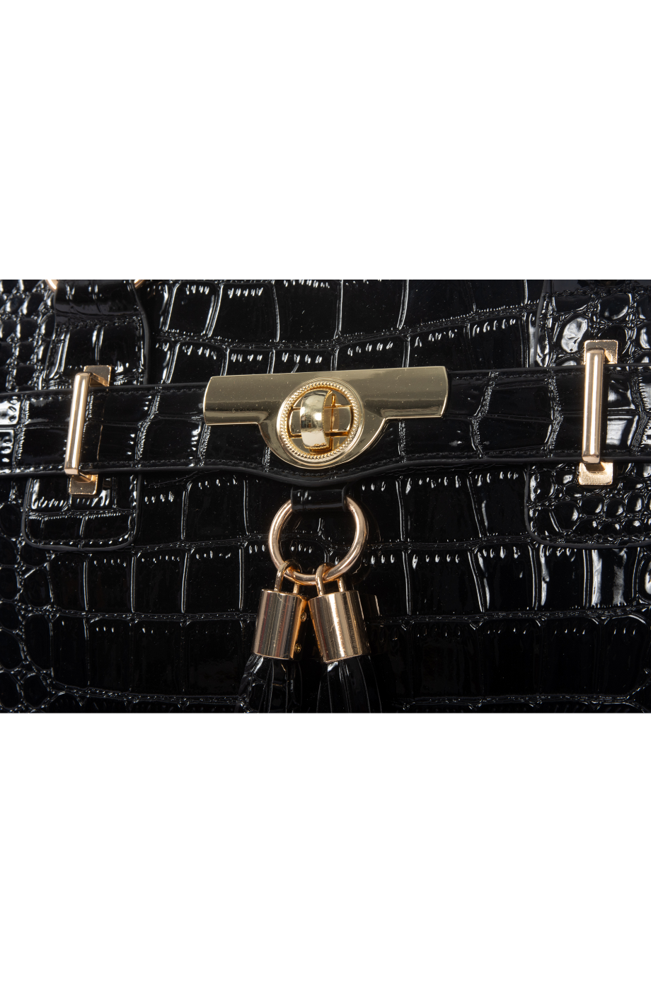This compact luggage pc case or underseat luggage with wheels features shiny black bling fabric and rich gold accent pieces like a gold twist pendant and chunky gold hoop with tassels. The perfect accessory to galentines casual brunch outfit winter.