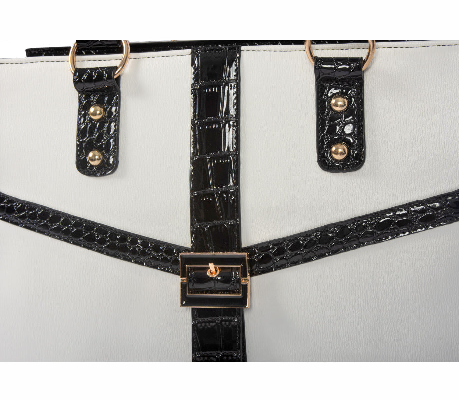 Close-up of white and black rolling briefcase bag for women, featuring alligator or croc texture, gold-tone buckle detail, and elegant lines. This chic rolling tote purse is perfect for professional settings and fits in the overhead compartment on most airplanes. Use as a legal rolling tote, professor bag with wheels, elementary school teacher bag or laptop carry-on for business class or economy class. A luxurious and useful holiday gift idea for her that blends fashion with everyday function.