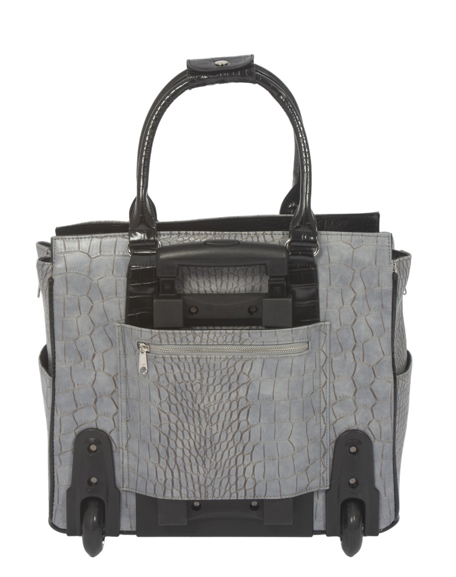 Back view of a laptop rolling bag for women, highlighting the retractable handle for easy maneuverability. Crafted with durable polyester faux leather, this stylish and functional bag is perfect for carrying work essentials and traveling with ease.