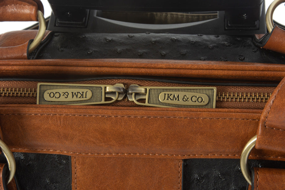 Detailed zipper pulls with the brand logo on this vintage doctor style trolley with laptop compartment. Quality is our top priority, so we splurge on the best quality materials for our casual office bags like these smooth YKK zippers and chic fabric.