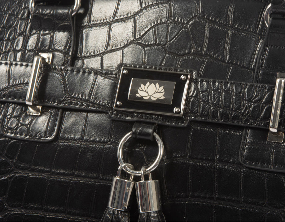 Close-up of black alligator-embossed rolling laptop bag for women with silver accents, showcasing its high-quality craftsmanship. Ladies laptop tote is perfect for professionals seeking stylish female laptop bags or womens computer bags with wheels.